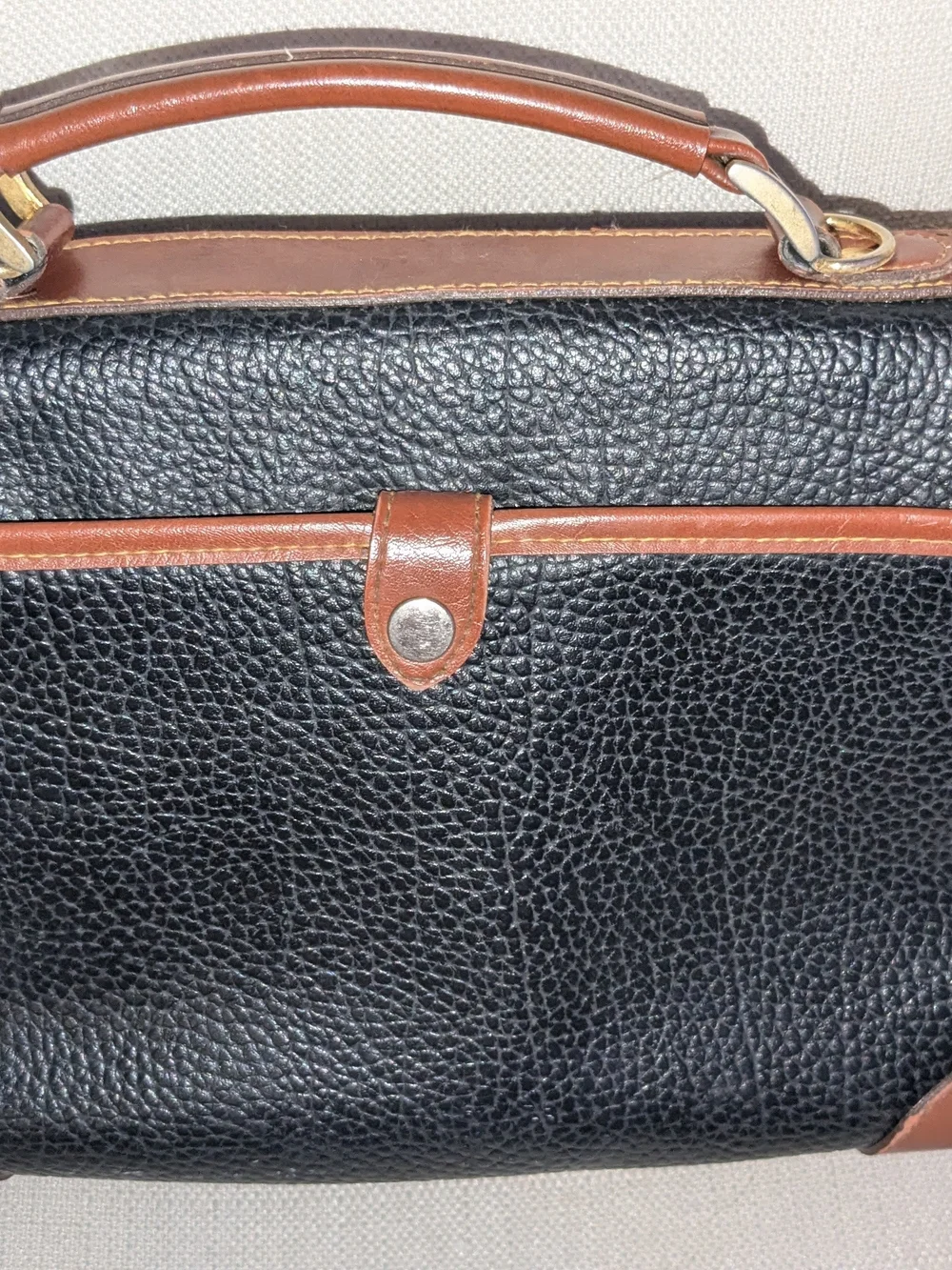 Dooney & Bourke Black Pebbled Leather Briefcase with Brown Trim